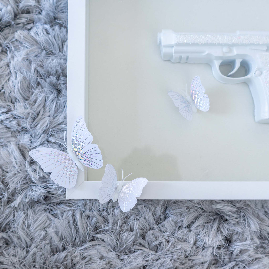 Gun with Butterflies - Luxxcreative